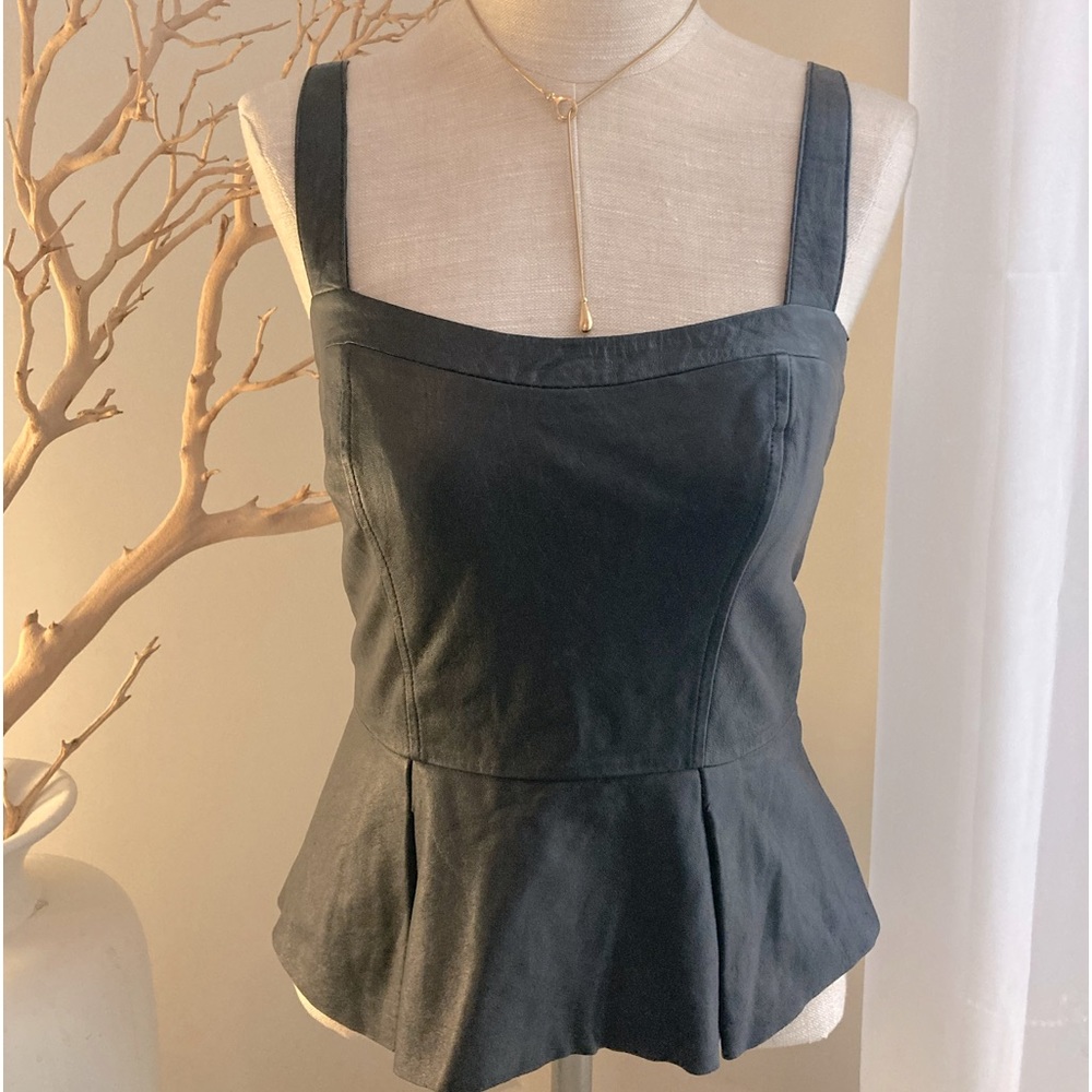 BEBE leather top with adjustable straps.